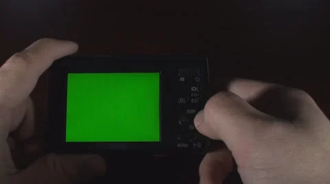Man Browsing Through Digital Camera Green Screen Stock Footage 36034976