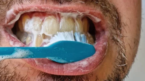 A man brushes his teeth, daily oral care Stock Footage 346694243