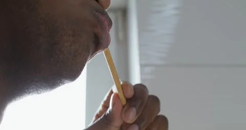 A man brushes his teeth Stock Footage 307535570