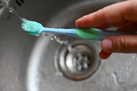  man brushes his teeth Stock Photos