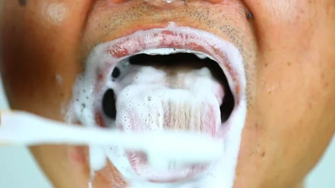 Man brushing his tonque , in studio  Chiangmai Thailand Stock Footage 151495794