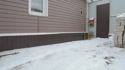 Man Brushing Snow Shovel  Stock Footage 59025061