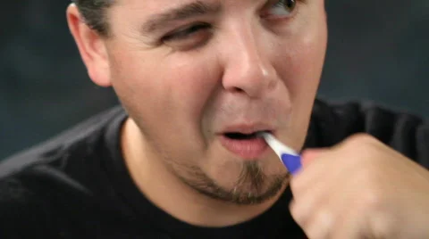 Man Brushing Teeth Stock Footage 839298