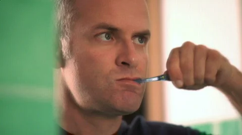 Man brushing teeth Stock Footage 862586