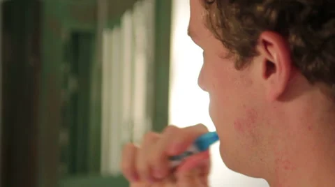 Man brushing teeth Stock Footage 40842969