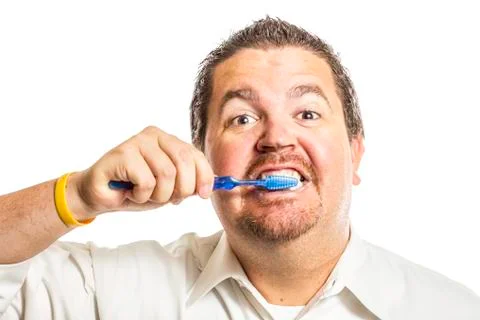 Man brushing teeth Stock Photos