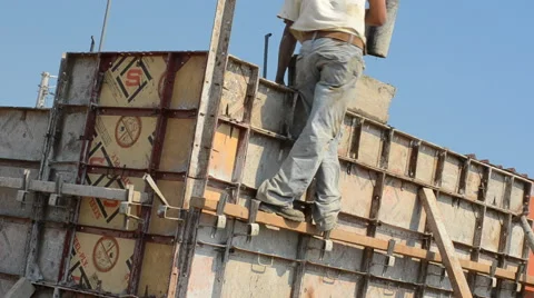 Man building a concrete wall Stock Footage 43200121