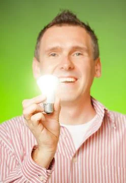 Man with bulb Stock Photos