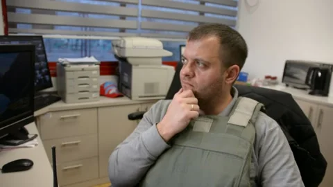 Man in bulletproof vest in security room. selective focus, Stock Footage 172364906