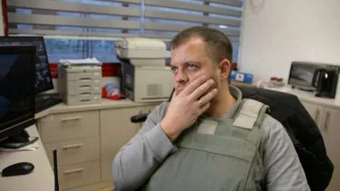 Man in bulletproof vest in security room. selective focus, Stock Footage 172364910