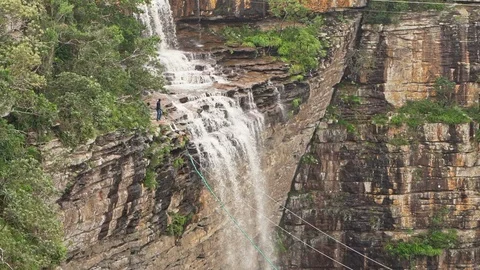 Man bungee swinging of the cliff at Oribi Gorge Stock Footage 114797945