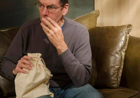 Man with burlap bag Stock Photos