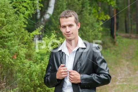 MAN IN BUSINESS SUCCESS IN THE FOREST. Business man with open eyes breathing Stock Photos