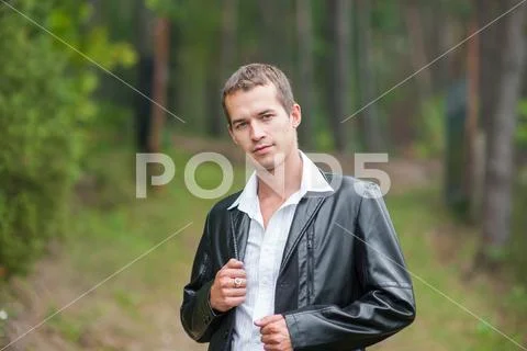 MAN IN BUSINESS SUCCESS IN THE FOREST. Business man with open eyes breathing Stock Photos