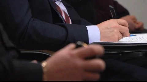 Man in business suit write down information during conference, close-up Stock-Footage 89180220