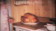 Man In Busy Kitchen Carving Turkey 1950S Vintage Film Home Movie 1118 Stock Footage