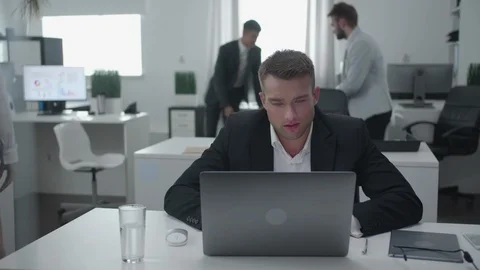 Man is busy with work at the office. Stock Footage 116619368