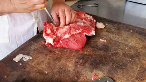Man Butcher working on debone beef steak meat,people job,food delivery industry Stock Footage 133839884