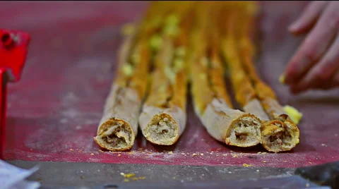 Man buttering turkish pizza called Pide Stock Footage 57666851