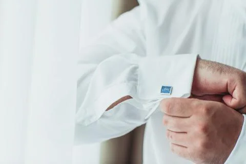 Man button up cufflinks Stock Photos