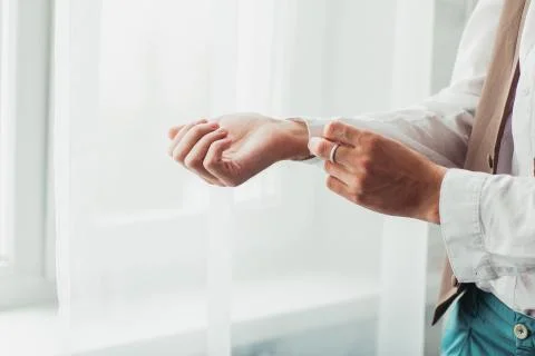 Man button up cufflinks Stock Photos