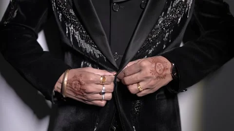 Man Buttoning Black Suit Jacket Close -Up 動画素材 325062806