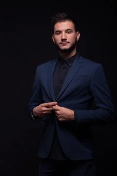 Man buttoning jacket suit Foto stock