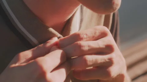 Man Buttoning Shirt, Close Portrait Showing Anxiety And Compulsive Actions 動画素材 324613285