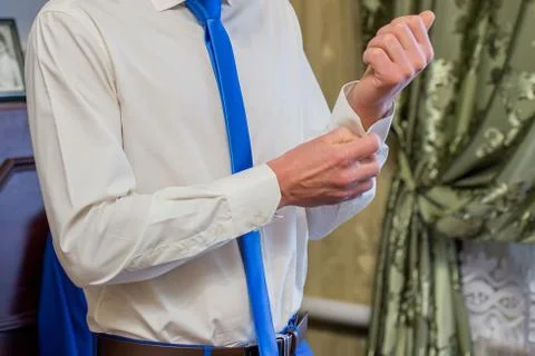 Man buttons button cuff sleeve Foto stock