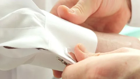 Man Buttons Cuff Links On The Sleeves Stock Footage 228735616