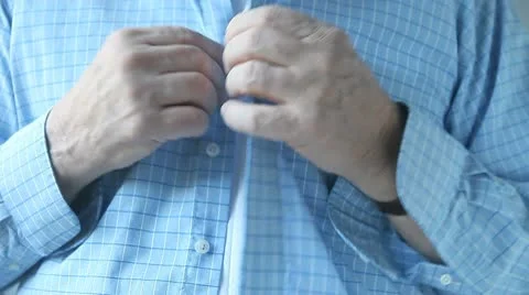 Man buttons shirt Stock Footage 9437901
