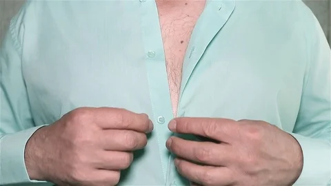 Man buttons shirt Stock Footage 91124040
