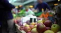Man buying fruit at local market, healthy lifestyle and food, view on apples HD Footage