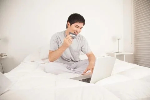 Man buying by network Stock Photos