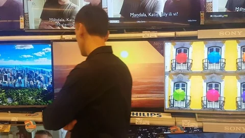 Man buying television Stock-Footage 82460984