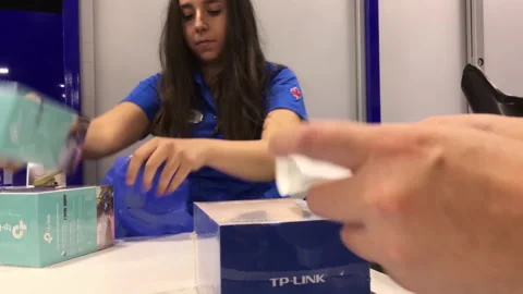 Man buying TP-Link smart light blub and taking receipt inside Best Buy store Video stock 237804952
