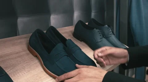 Man buys classic clothes and shoes Stock Footage 66428099