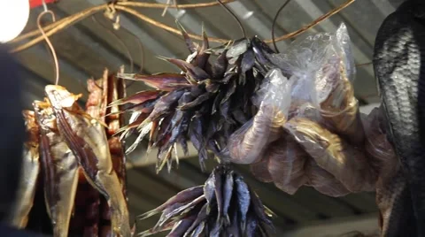 Man buys dried fish. Stock Footage 66461925