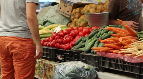 Man Buys Fresh Vegetables Stock Footage 46116885