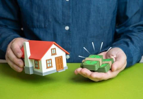 A man buys a house and puts down cash as collateral. Property appraisal. Rent Stock Photos