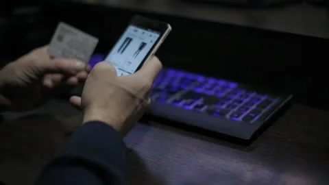 A man buys an online store on the Internet using a smartphone Stock Footage 103575252