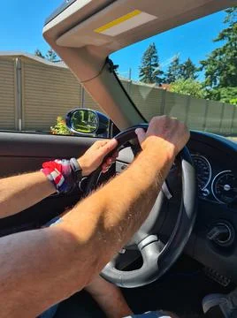 Man in a cabrio. Stock Photos