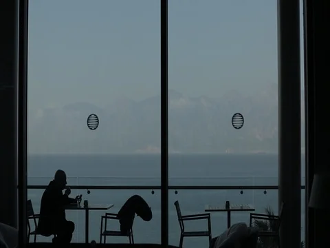 Man in a cafe, coffee break of a Turkish man. Turkey, Antalya Video stock 81782818