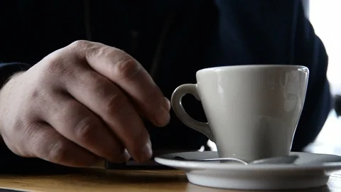 A man in a cafe drinking coffee Stock Footage 87646067