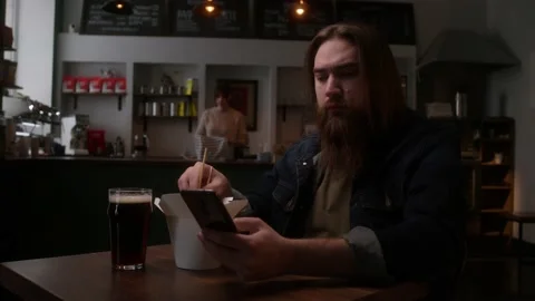 A man in a cafe Stock Footage 223881586