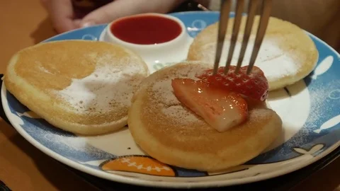 The Man in Cafe is Having Supper in a Cafe and Working Behind a Laptop. They Stock Footage 73495970