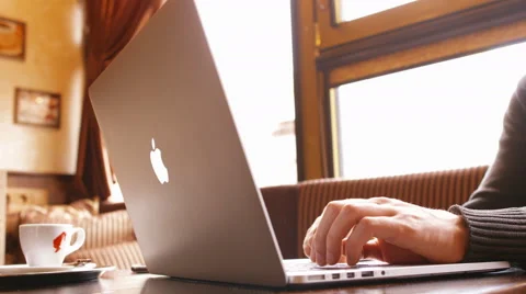 Man in the cafe with macbook Stock Footage 50205950