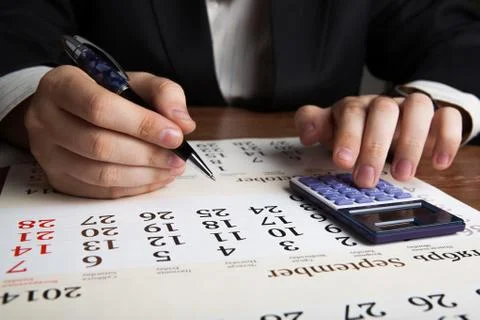 Man calculates future plans Stock Photos