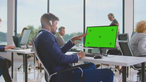 Man in call centre speaking with client Video stock 164653174