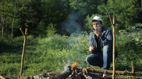 Man call by smartphone in camping Stock Footage 64057817